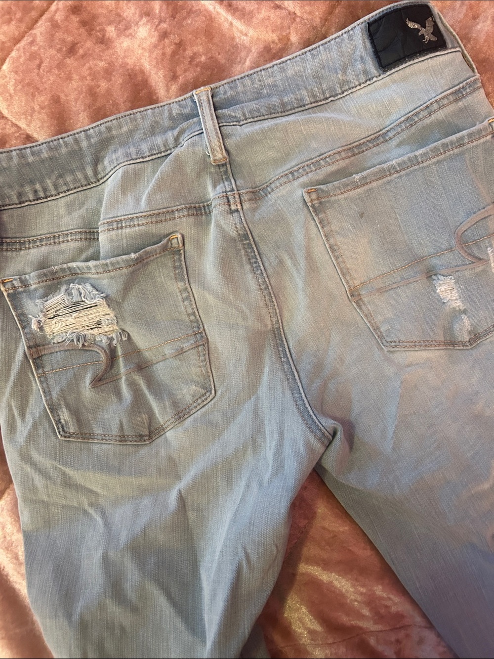 American Eagle Outfitters Light Blue Skinny Jeans with Back Pocket Distress